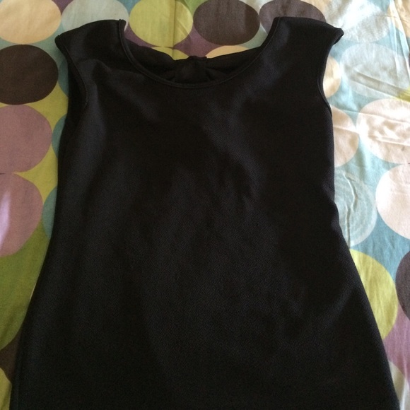 Black top with bow on the back