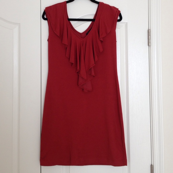 Rust colored dress with a front  ruffle
