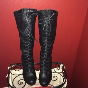Black faux leather riding boot