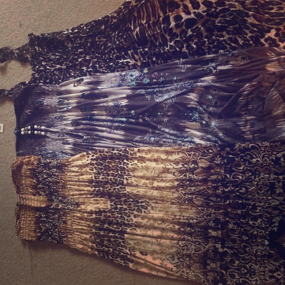Three dresses. NEVER WORN.