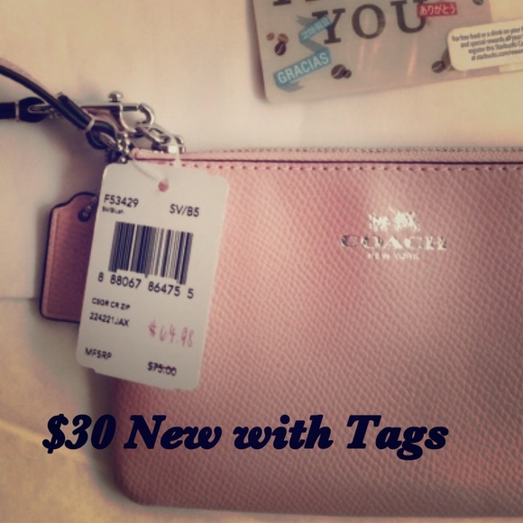 Brand new pink Coach wristlet.