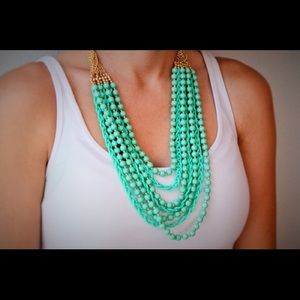 Teal necklace.