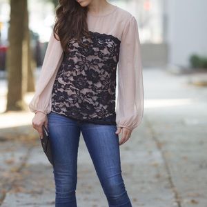 Black lace and light tan shirt