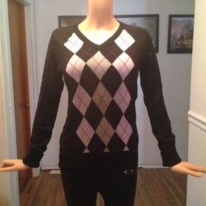 Black V neck sweater with argyle front