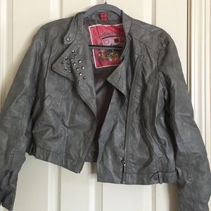 Grey leather jacket with studs on collar