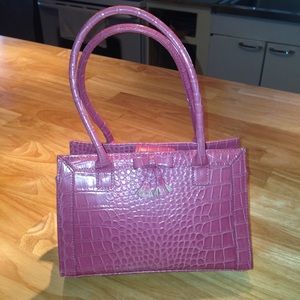 Pink crocodile purse