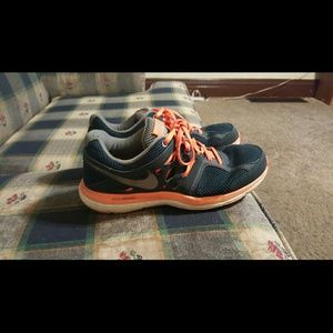 Orange and black nikes