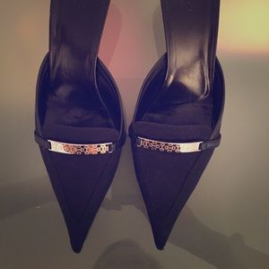 Classic Gucci kitten heeled slides.