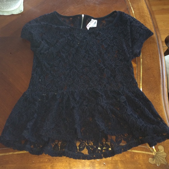 Small dressy flower black top