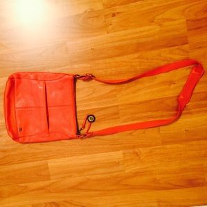The Sak Iris (coral) cross body bag