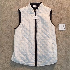 Reversible quilted vest.
