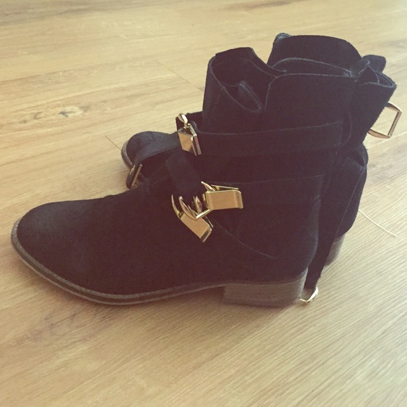 Black suede ankle booties with gold buckles!