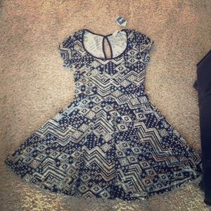 Black and cream short patterned dress