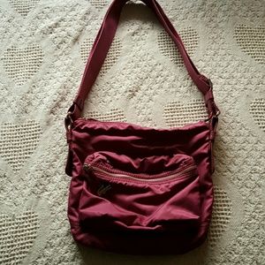 Lacoste mauve nylon bag with adjustable strap