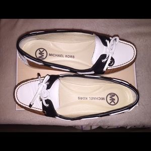 Michael Kors leather moccasins.