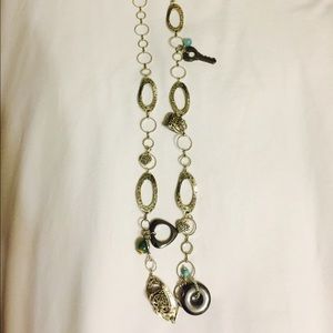 Whimsical solver necklace.