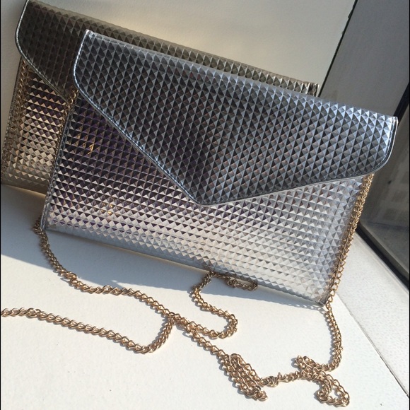 SOLD!  ROCK OUT CLUTCH (SILVER)