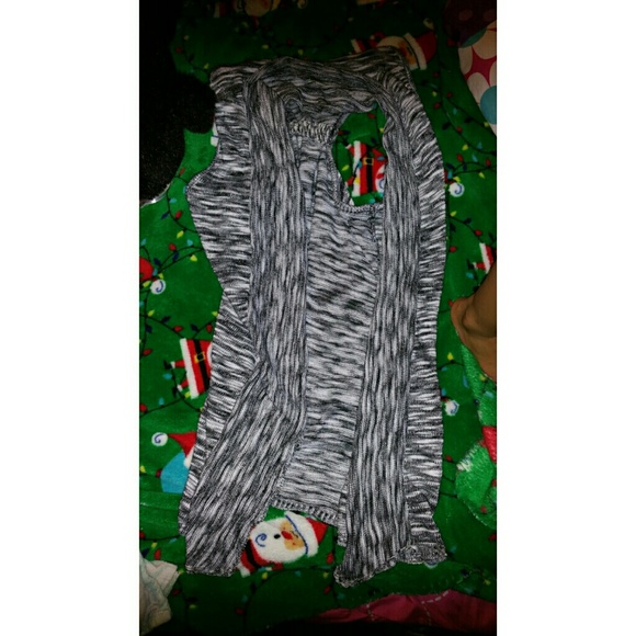 Bundle of sleeveless cardigans