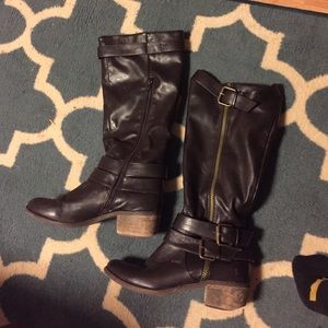Slightly worn riding boots