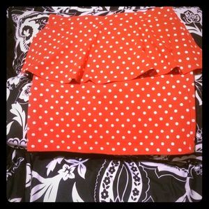 Red skirt with polka dot shirt