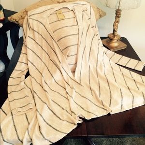 American eagle cardigan cream with gray stripes.