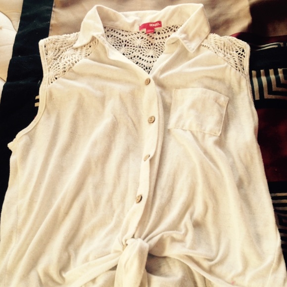 Beige sleeveless button down shirt