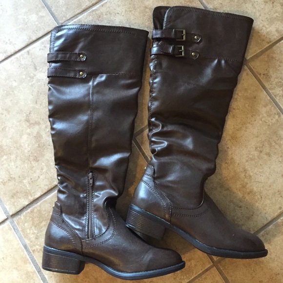 High brown boots.