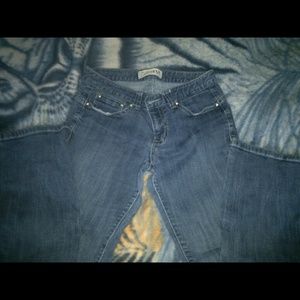 Like new, tags cut out but are an 8,