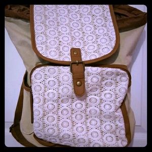 Crochet and tan backpack