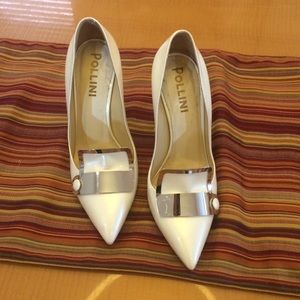 Polling white pointy heels so 6.5