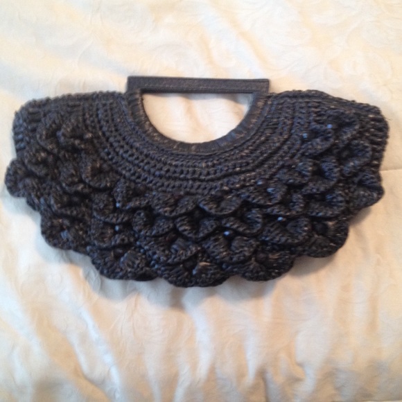 Black straw clutch.