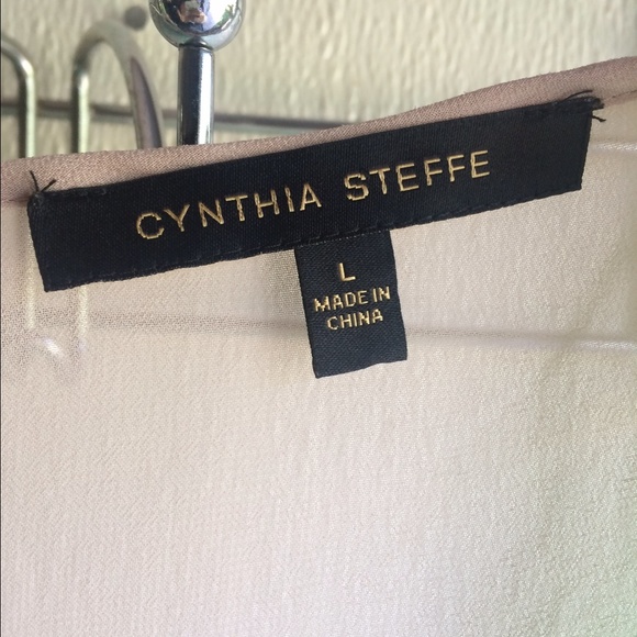 Bright green peplum with sheer tan on back. - Picture 3 of 3