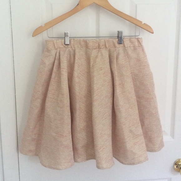 Aritzia flared cream skirt with subtle stripes