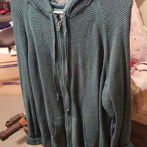 It is a green waffle knit hoodie. 3x