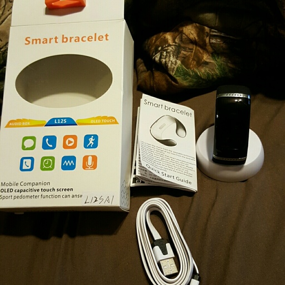 It is  a black smart bracelet. It is brand new.