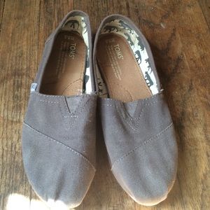 Pair of worn grey toms size 6 1/2