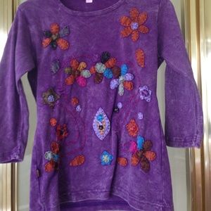 Top with quilted flowers