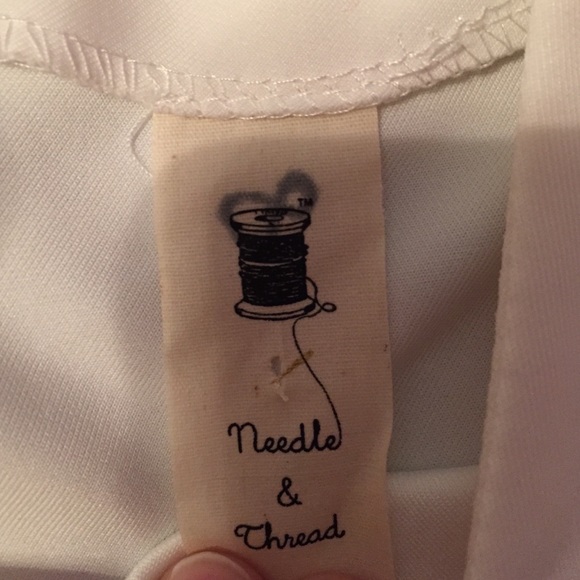 Super cute white tank! - Picture 2 of 3