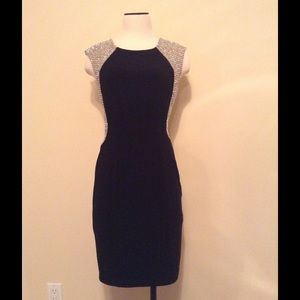 Black cocktail dress with gold beaded back