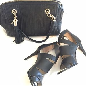 Calvin Klein handbag with tassel and gold detail