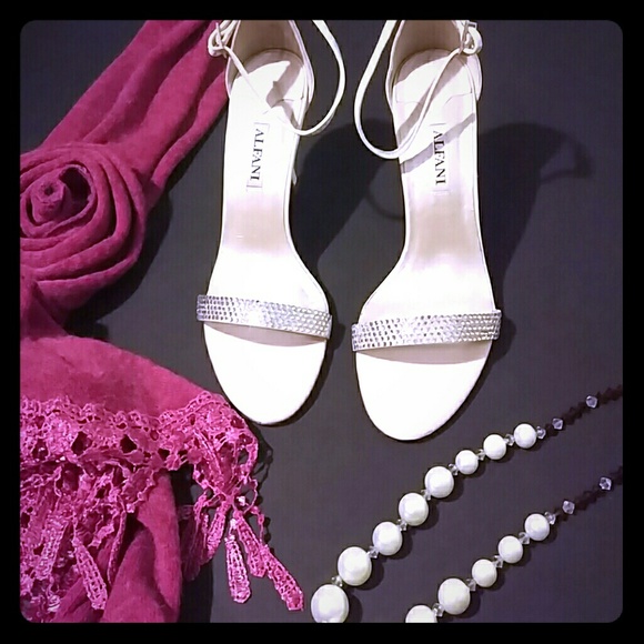 Cream colored slingbacks with rhinestones