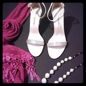 Cream colored slingbacks with rhinestones