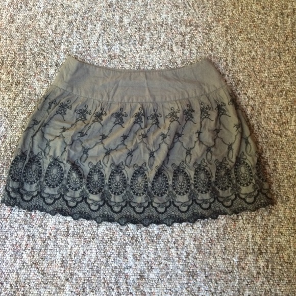 Olive green skirt.