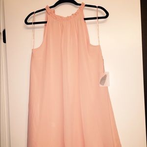Peach halter dress.