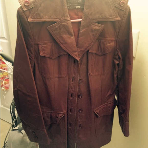 Super cute and almost vintage brown leather jacket