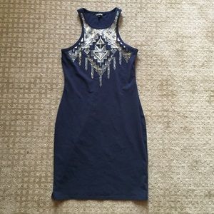 Body-con dress with sequin embellishments.