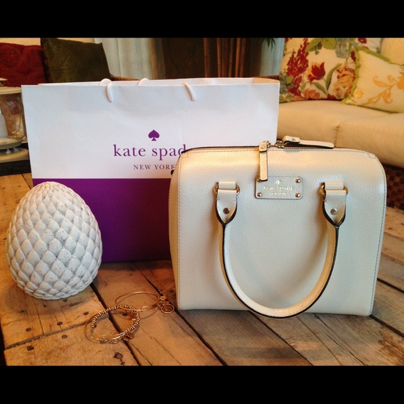 BNWT Kate Spade porcelain colored leather handbag.