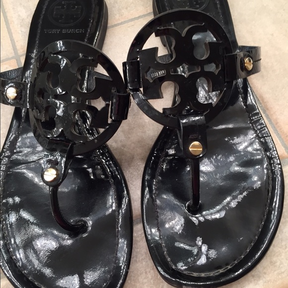 Tory Burch black patent sandals.