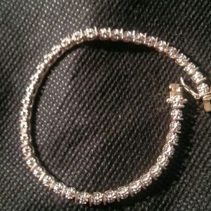 Very nice sterling silver and gold tennis bracelet