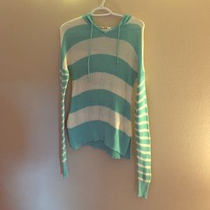 Cute  blue and cream colored thin knitted hoodie.